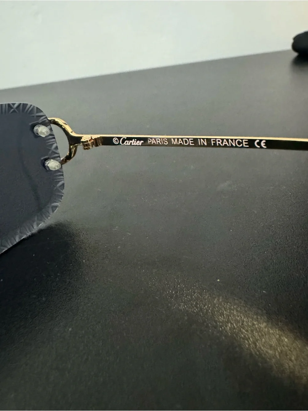 Cartier Designer Black Gold Rimless Rectangle Diamond Cut Engraved Sunglasses Co